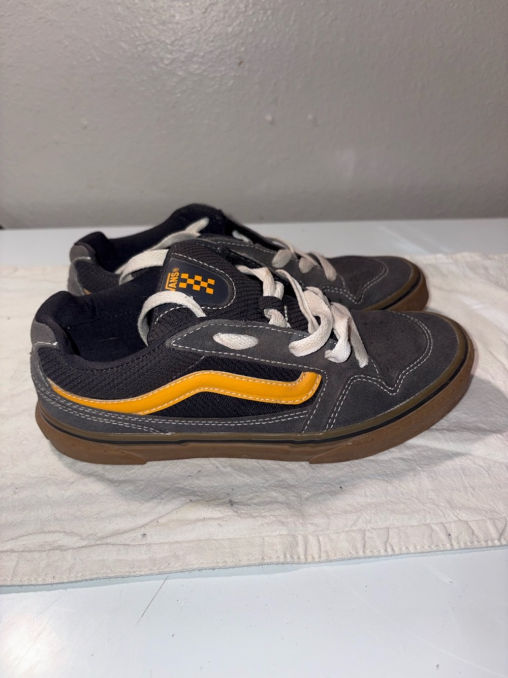Vans Kids Black Low-Top Sneakers with Yellow Side Stripe